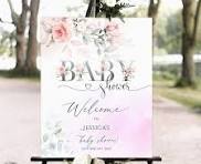 Transform your baby shower with floral-themed welcome signs and decor.​